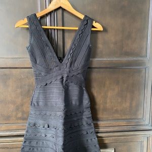 Herve inspired black a-line scalloped dress.